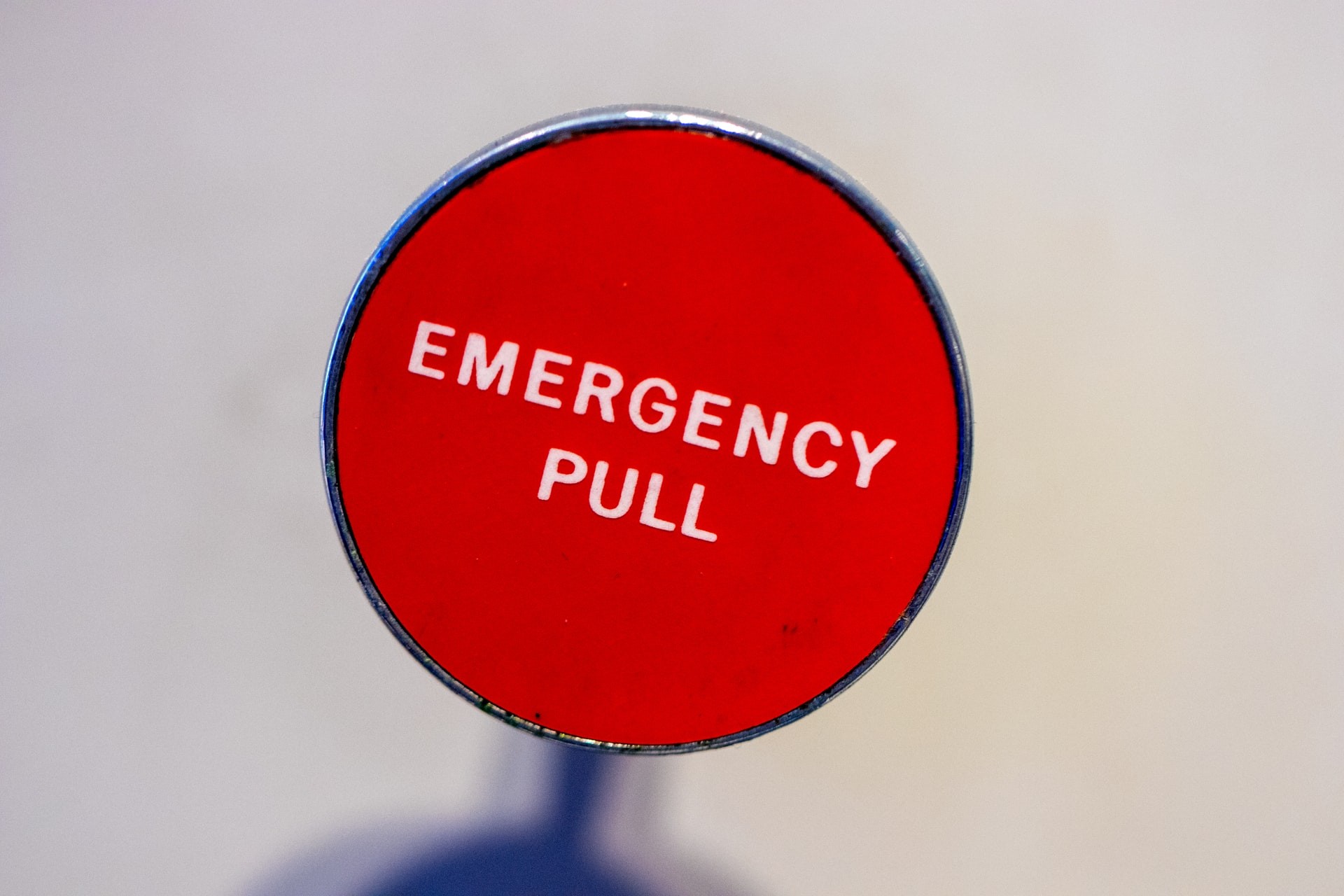 botão de emergência
